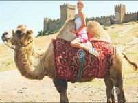 Blonde_on_2-Humped_Camel.jpg